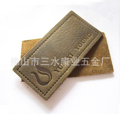佛山市三水康業(yè)五金廠 專業(yè)提供中高檔熱壓絲印皮標(biāo)皮牌，助力服裝服飾品牌升級